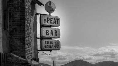 Stiff drinks, cold beer, great large steaks, and if you want you can cook your own just the way you like it. Only in Montana! Definitely off the beaten track!