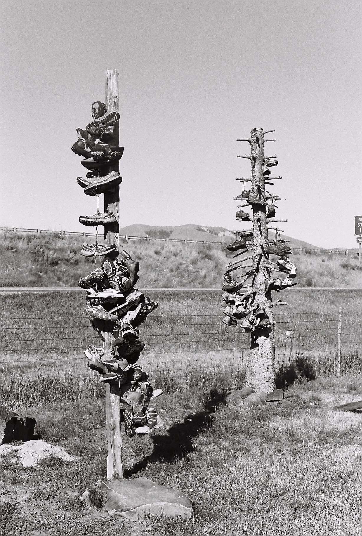 Travel's toll. Shoes from adventures on the CDT hang as homage to nature's ability to challenge our bodies. Thankful for replacement shoes, to keep on trekking. #Adventure