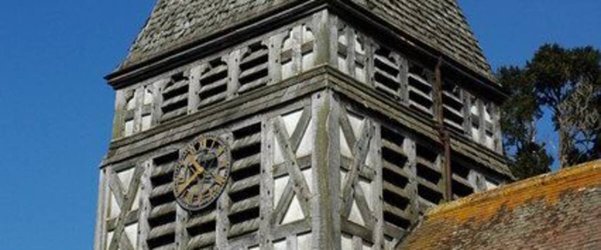 The spire of Bromesberrow Church The timber-framed bell tower and shingle spire of St Mary's church at Bromesberrow was rebuilt in 1874-5.