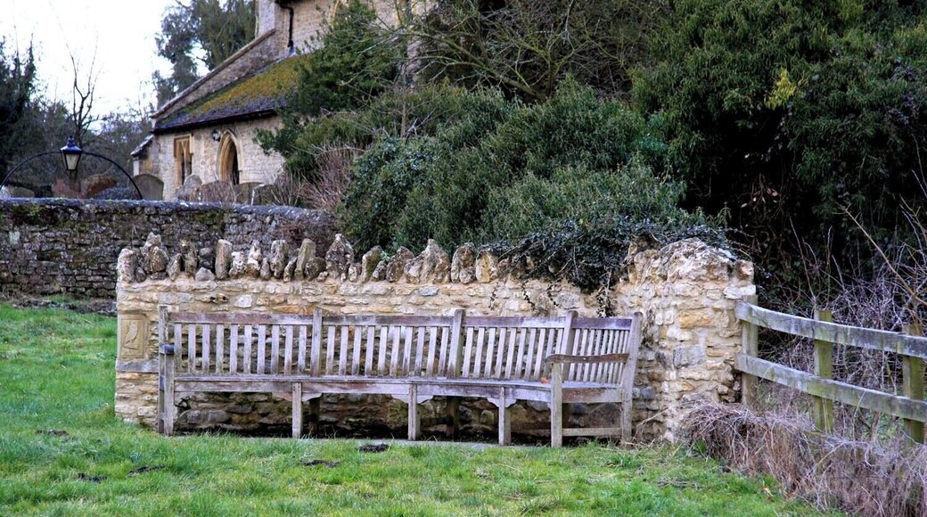 Bench on Hillcroft Millennium Green outside St John's parish church, Stanton St John, Oxfordshire