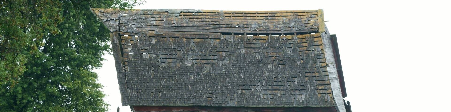 This old barn is still holding on, but the law of gravity is against it!
