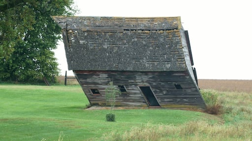 This old barn is still holding on, but the law of gravity is against it!