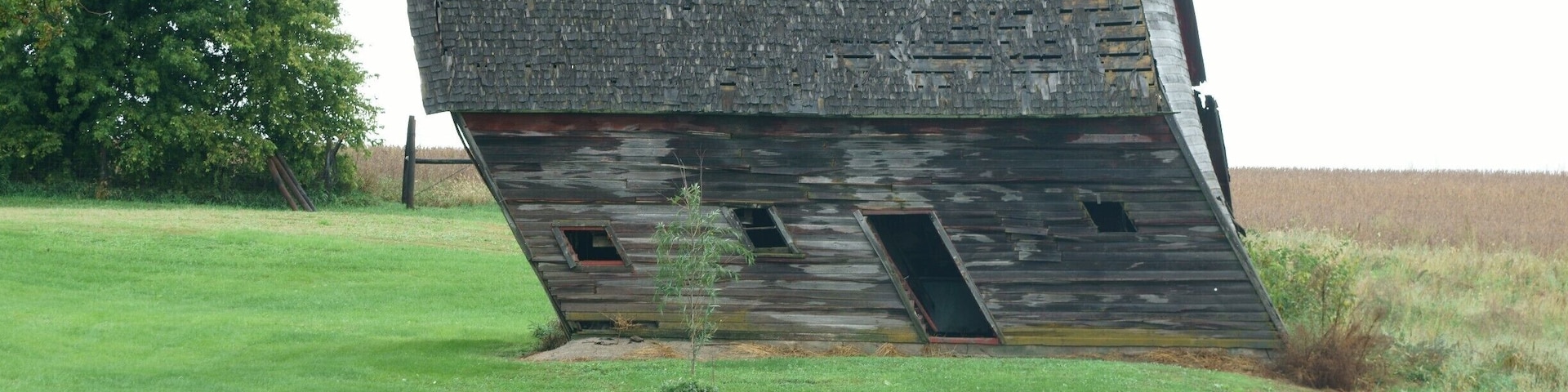 This old barn is still holding on, but the law of gravity is against it!