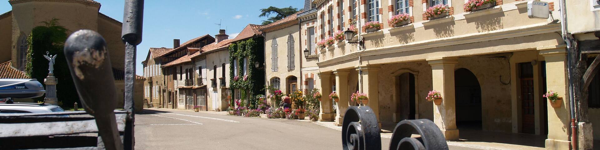 Beautiful view of the main street in the French village of Lupiac in Gascony, France