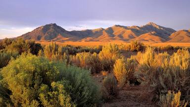USA, Nevada, Denio. Dusk settles over the Bilk Creek Mountains, Denio, Nevada.