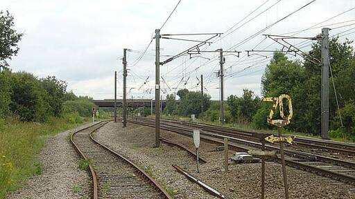Track split After passing through Rossington, the line expands from 2 to 4 tracks. In addition, the currently unused track in the immediate foreground was the exit onto the main line for coal trains from Rossington Colliery. (NB this picture was taken from a public footpath crossing)