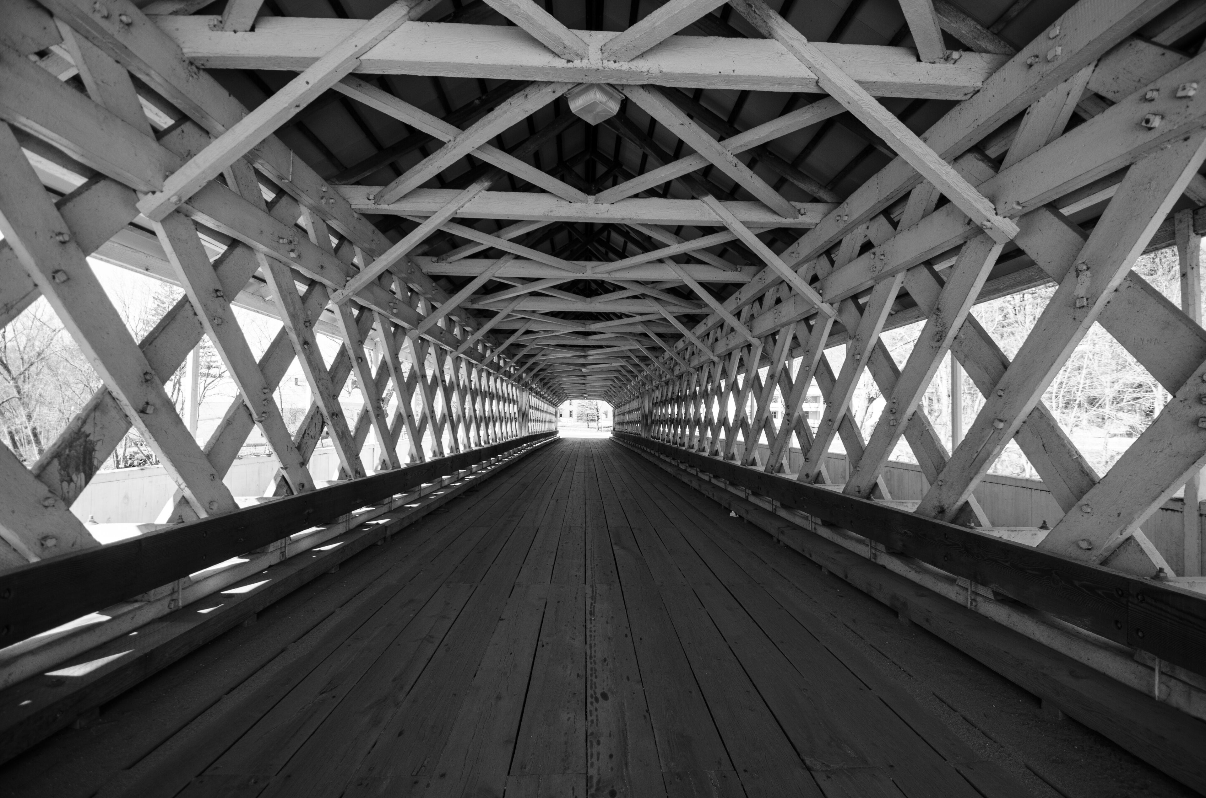 Black and white Lattice work detail on The Ashuelot Covered Bridge crosses the Ashuelot River and Bolton Road in Winchester New Hampshire