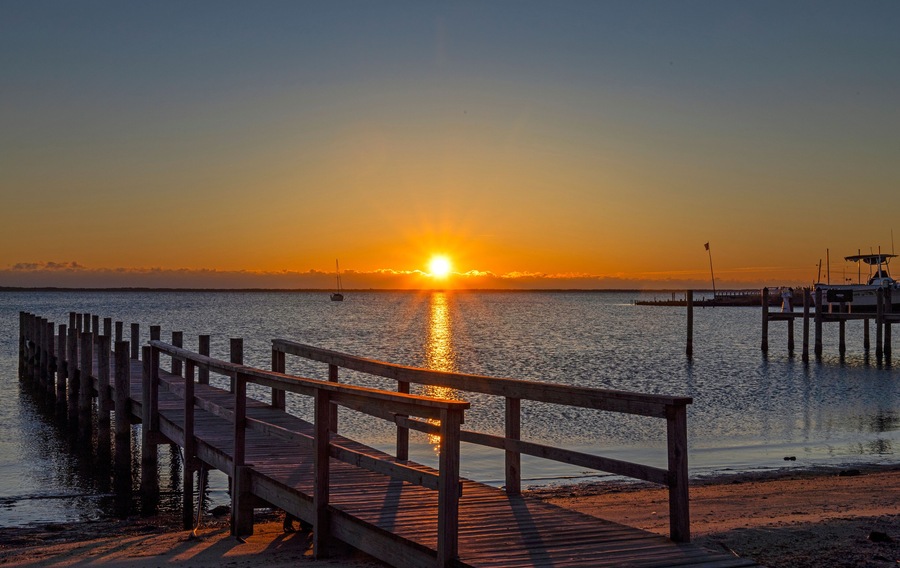 A Public Dock At Sunrise Time On Barnegat Bay In NJ