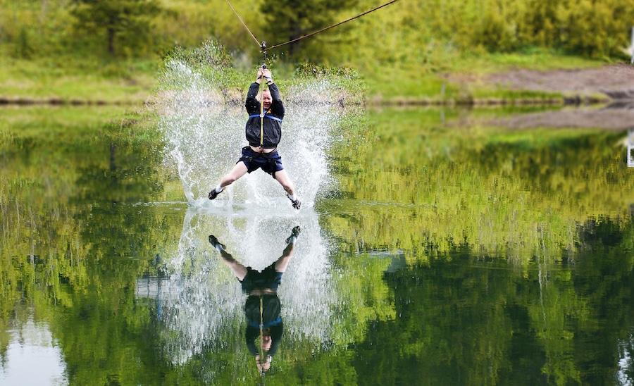 Soaring over Beaver Mines Lake on a zipline is fun for the young and young at heart. A part of the Scout Camp this ride will make your heart beat, and maybe some wet feet. #Adventure