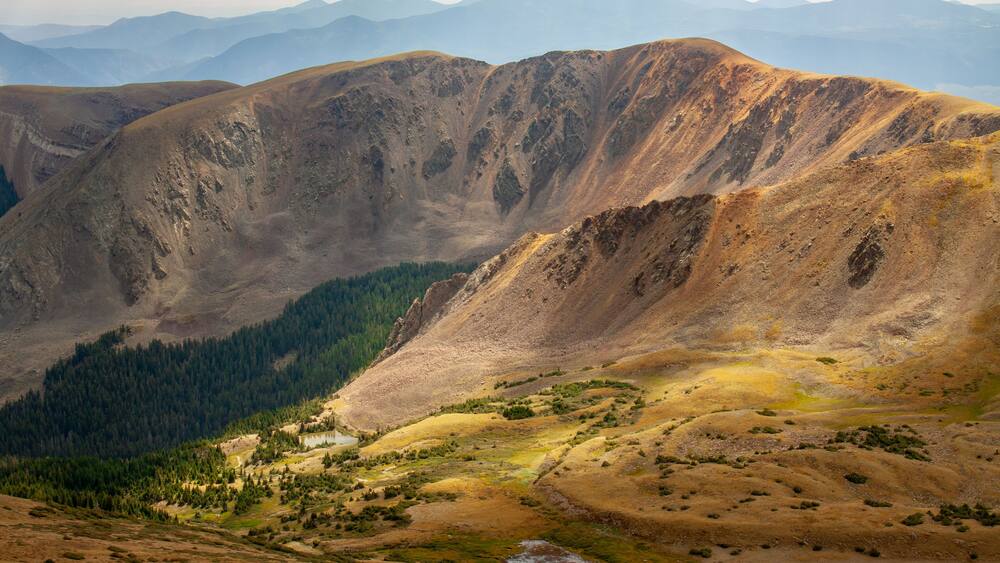 View of the Sangre de Cristo mountain range in the Rocky Mountains as seen from Wheeler Peak, the highest point in New Mexico, in Taos, New Mexico, USA