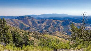 Soaring to nearly 10,000' high, the Windy Point Vista is a spectacular vantage point of the entire Lincoln National Forest and Tularosa Basin. Alto, New Mexico