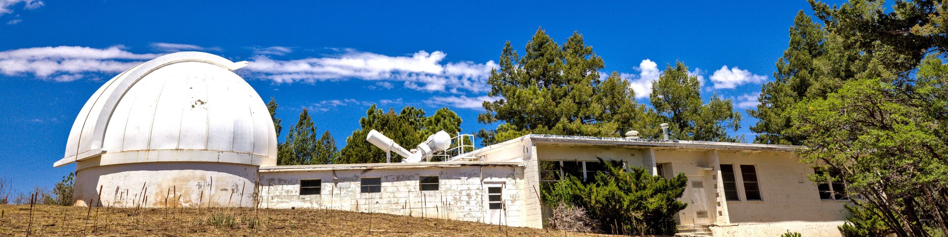 Telescope enclosures are scattered across the ridgeline at 9200 ft., Sunspot Solar Observatory is home to gorgeous vistas, historical landmarks, and one of the largest active solar telescopes.