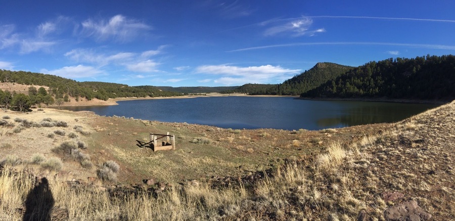 Quemado (burnt) Lake in central New Mexico is a relatively quiet recreation area with dropping water levels that have restored boat use, which is a gain for hikers who like to peacefully trek its 1.2 mile perimeter.