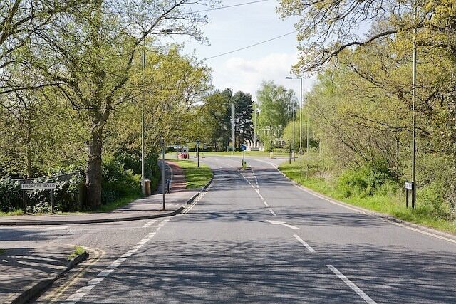 Looking along A27 Botley Road, North Baddesley. Firgrove Road is in foreground left. The quite striking building in the distance behind the trees is 789386