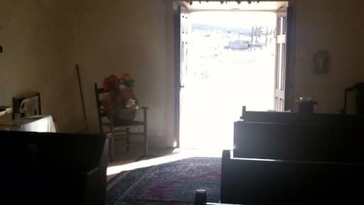 I may not have the town correct, but his old church is somewhere in the vicinity. The groundskeeper claims to be many things, including the former town mayor. He gives an enlightening tour!