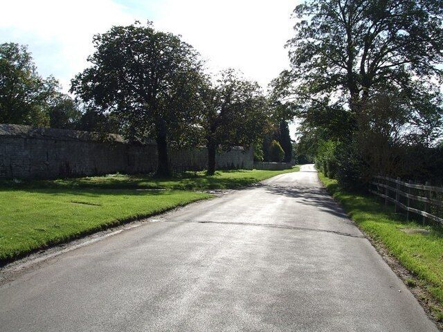 Lane past Dinton Hall. The wall on the left of this image hides 247494 from passers by. The lane leads to the remarkably attractive village of Dinton which contains many picturesque houses and cottages.