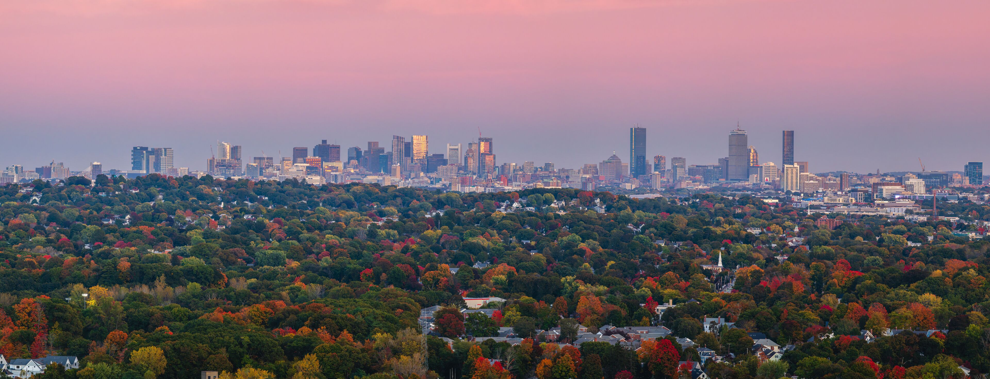 Panoramic view of Boston skyline at autumn sunset