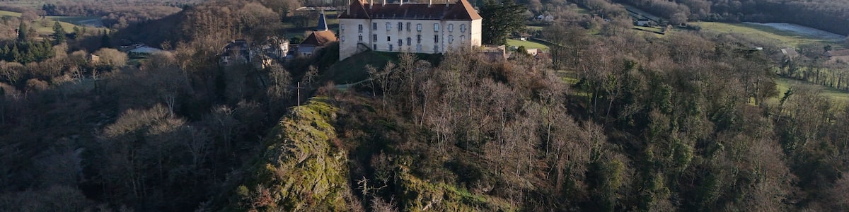 Larochemillay village in Burgundy, France, in winter with forests, hills and meadows