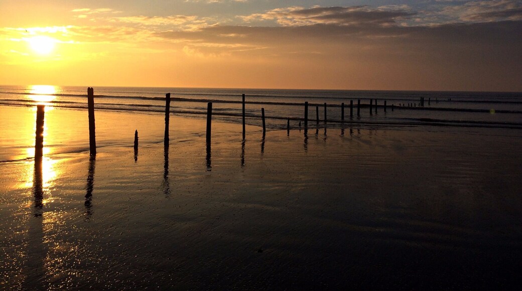 Berrow Beach at sunset. Large stretch of sand perfect for watching the sun go down #BeachBound