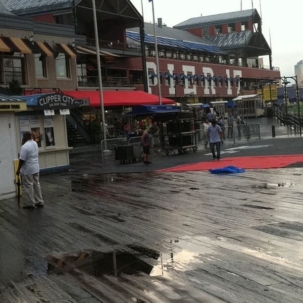 A pier with a 'Clipper City' sign, a red awning, and a 'Pier 17' sign.