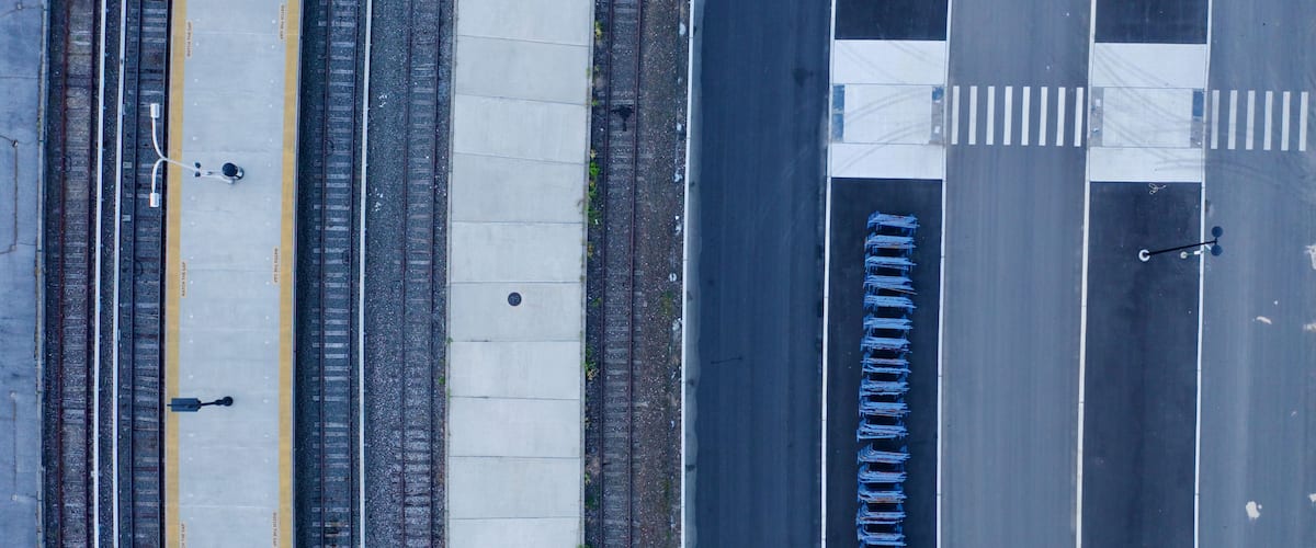 Top view of empty train station platforms in Elmont, NY