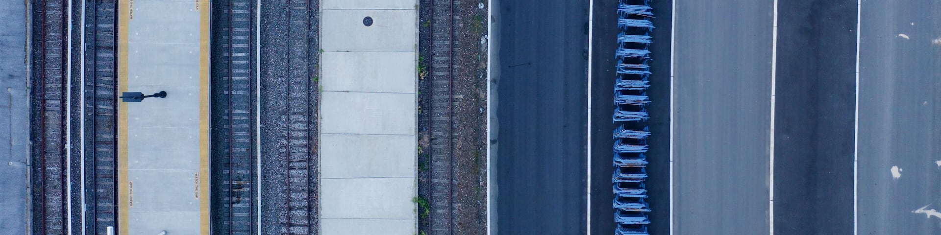 Top view of empty train station platforms in Elmont, NY