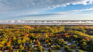 Trumansburg, NY, USA - October 17, 2025: Aerial photo over the Village of Trumansburg, NY with view of Cayuga Lake