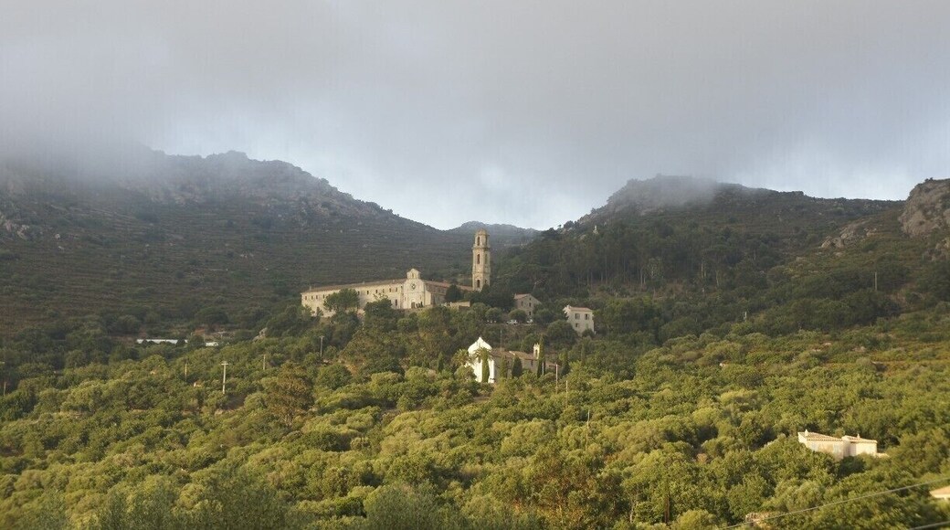 Pigna, Corsica is surrounded by misty mountains just before sunset.
#corsica #roadtrip