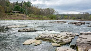 Cascades of Upper Delaware River at Skinners Falls Rocky Beach in Narrowsburg, NY.
