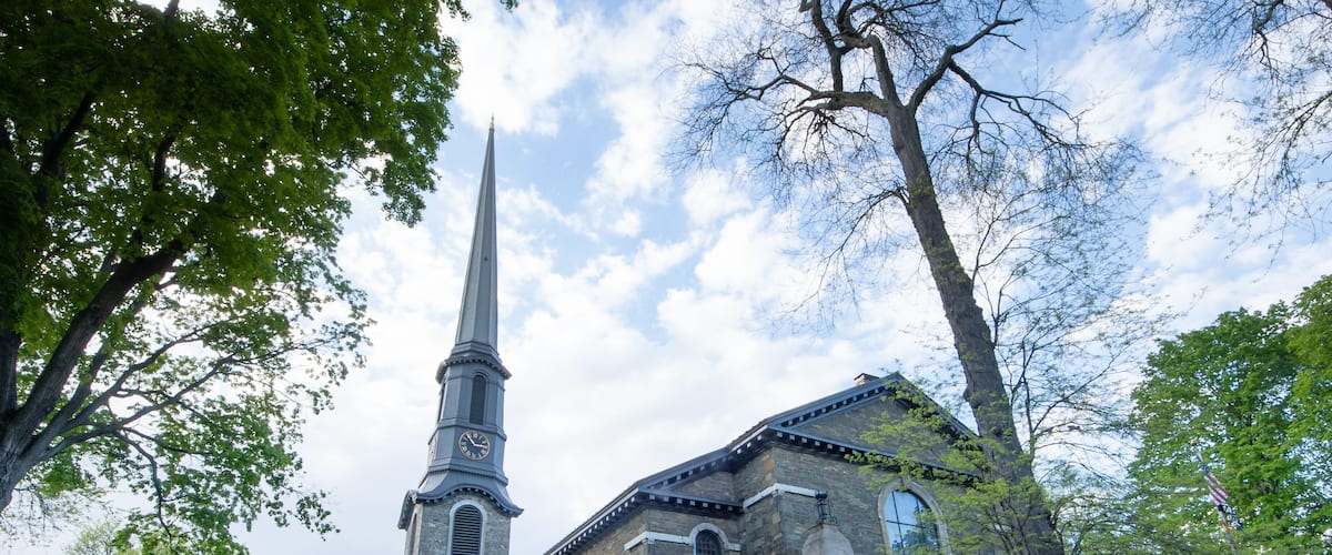 Kingston, NY - USA- May 12, 2021: The Old Dutch Church, a 19th-century bluestone church and cemetery located on Wall Street in the Kingston Stockade District.