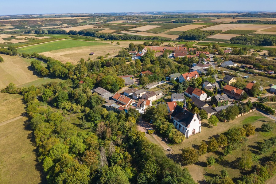 Bird's eye view of the village Laurenziberg / Germany in Rheinhessen with its St. Laurenzi church