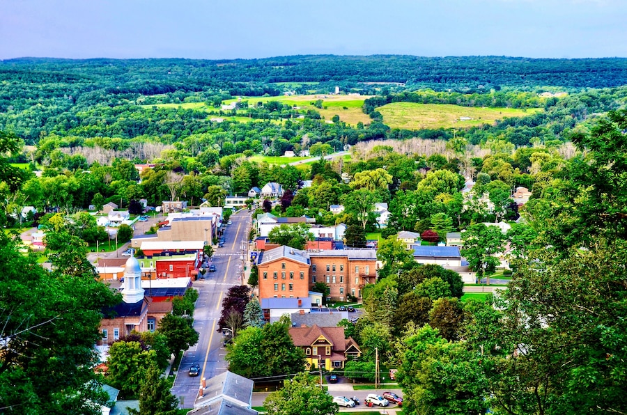 Aerial view of Montour Falls, a small historic village - Main Street, and surrounding hill forest landscape, in upstate New York. It’s next to hot tourists area of Watkins Glen and the Seneca lake