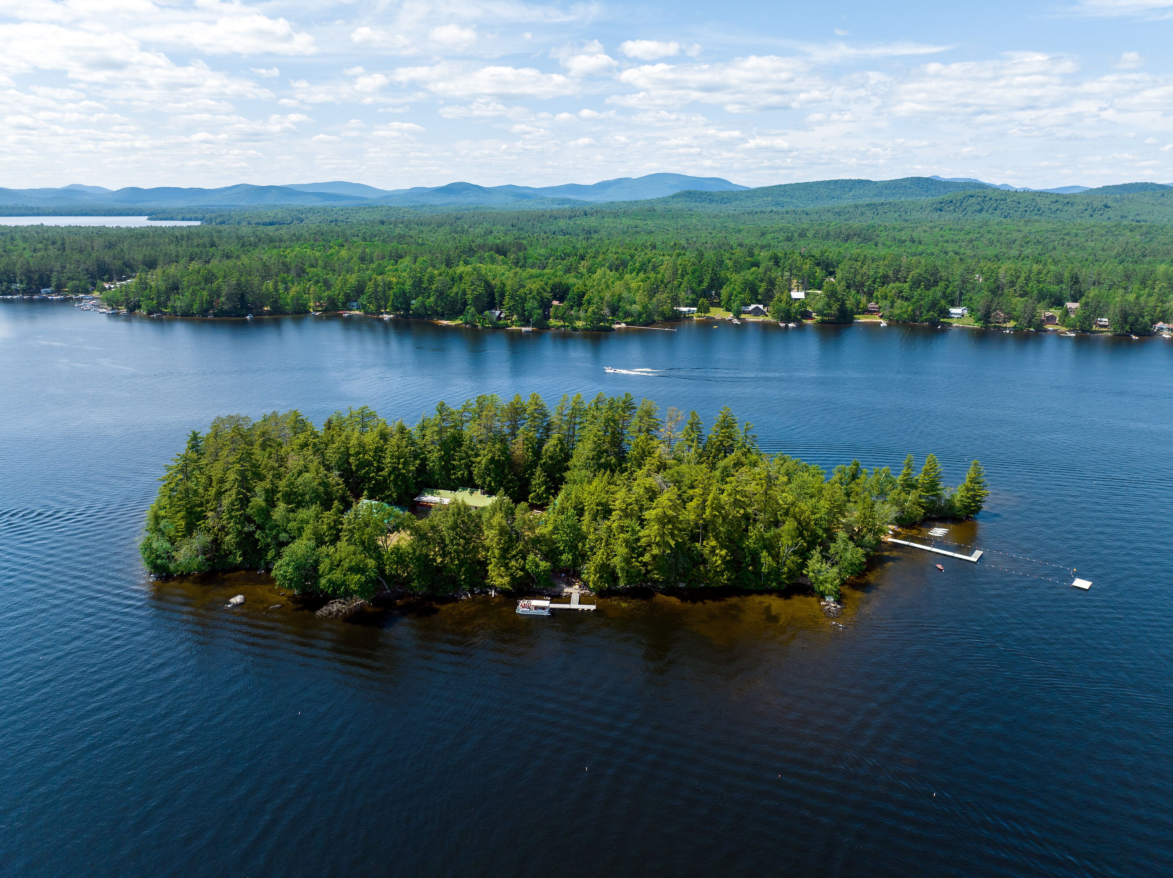 Aerial photograph of small island the town of Speculator, Lake Pleasant, Upstate, New York, Adirondacks, USA. July 1, 2022.