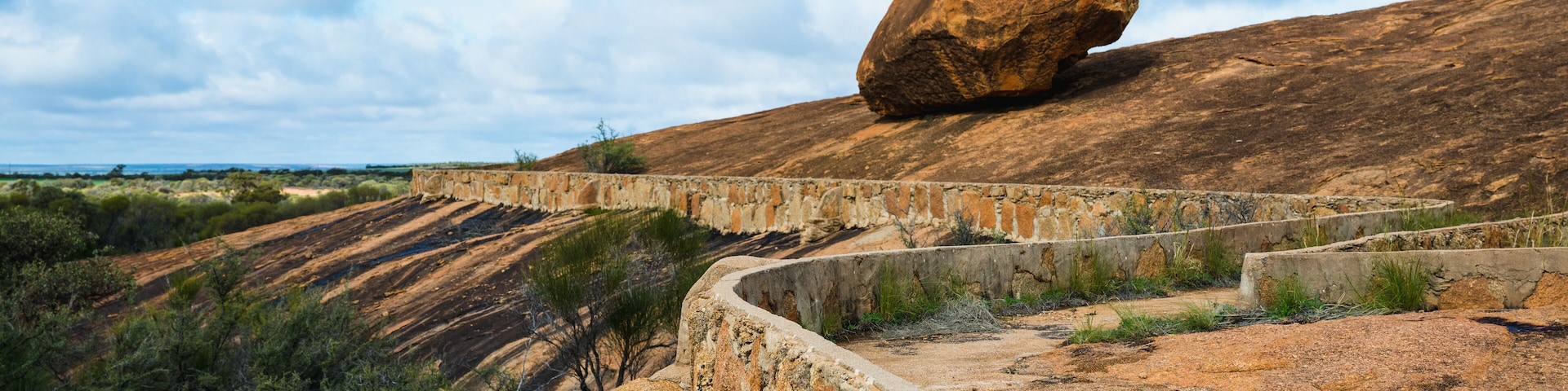 Beringbooding Rock is a granite rock formation north east of Mukinbudin in the eastern Wheatbelt region of Western Australia. The site features large balancing boulders with interesting shapes.