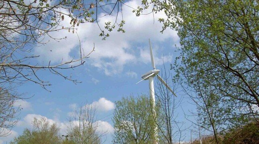 A single wind turbine looms over the Trans Pennine Trail