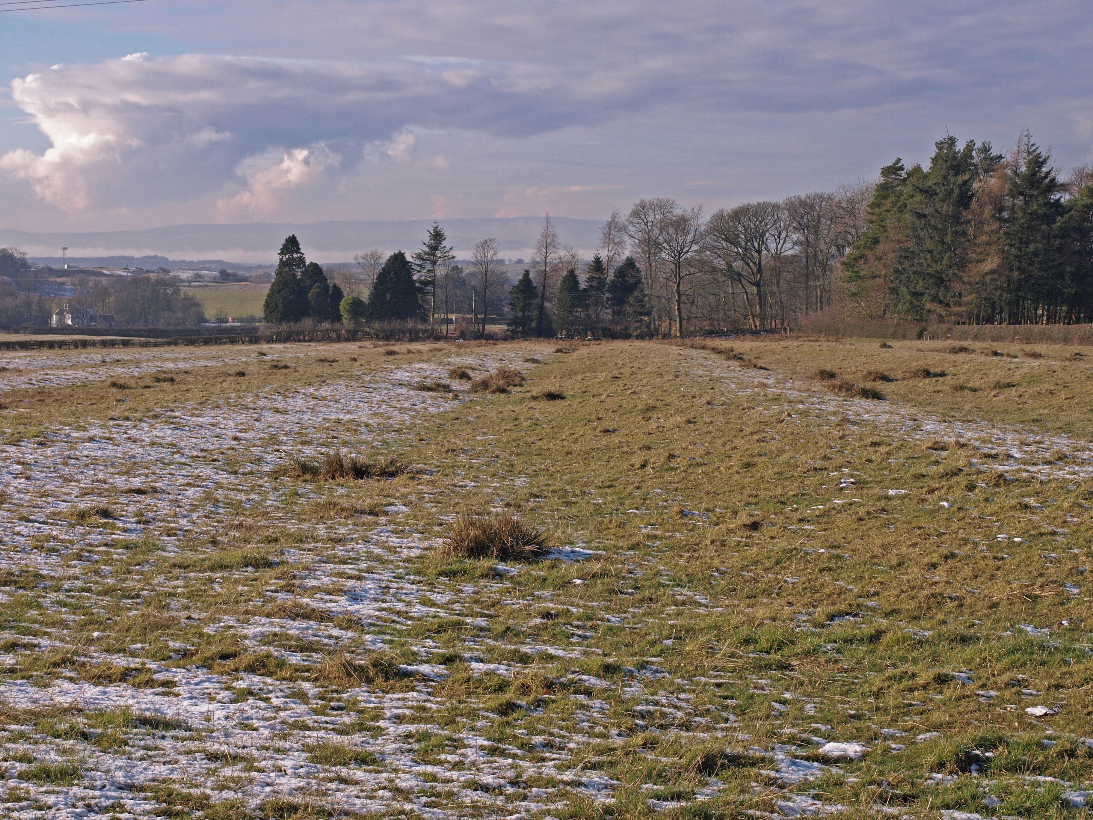 Field, Dunlop The sun has melted some of the frost and light snow from the ridges in this field. Way in the distance fog fills the Garnock valley below the hills.