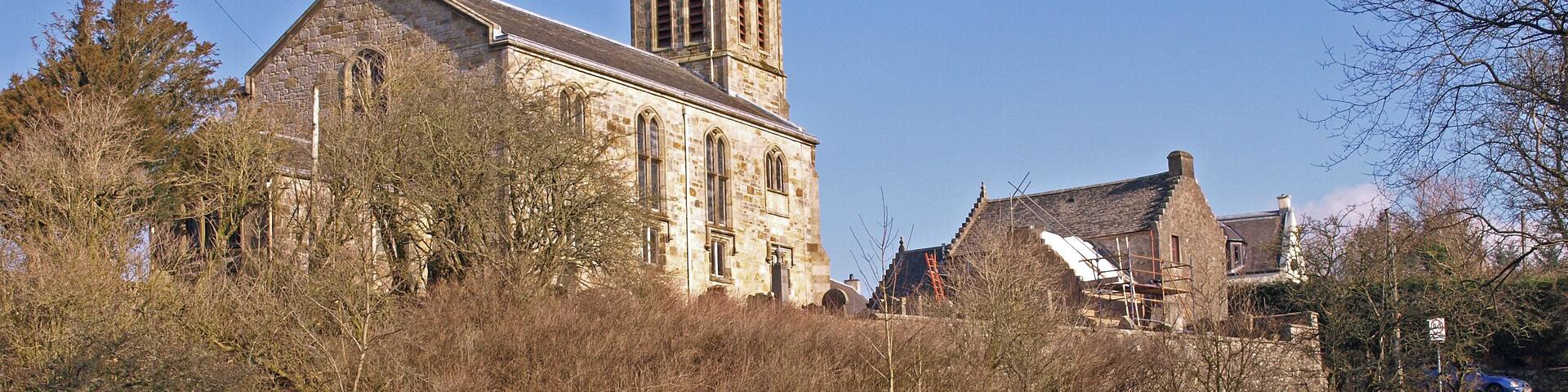 Straightbow Bridge, Dunlop Crossing the Glazert Burn with Dunlop Kirk in the background.