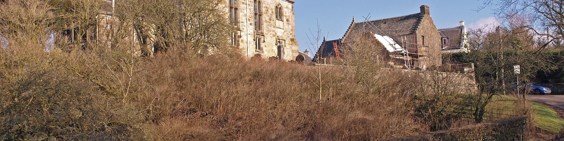 Straightbow Bridge, Dunlop Crossing the Glazert Burn with Dunlop Kirk in the background.