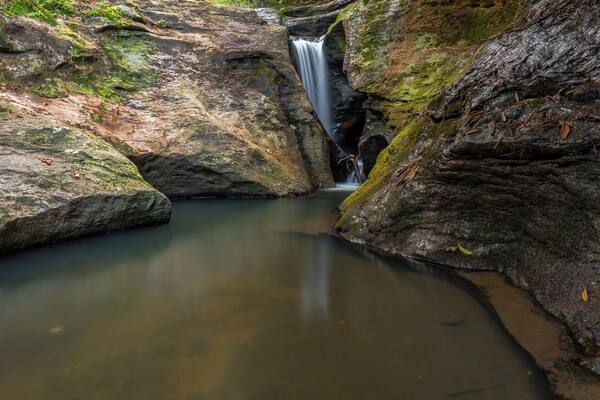 A very cool and unique spot in the South Mountains Game Lands of North Carolina - Pot Branch Falls or simply just "The Pots". It is a short waterfall that is very picturesque and local favorite swimming hole spot. For a video guide of this location, please visit: https://www.hdcarolina.com/episode/pot-branch-falls