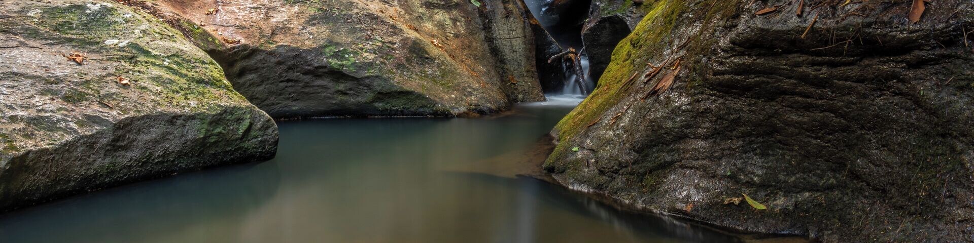 A very cool and unique spot in the South Mountains Game Lands of North Carolina - Pot Branch Falls or simply just "The Pots". It is a short waterfall that is very picturesque and local favorite swimming hole spot. For a video guide of this location, please visit: https://www.hdcarolina.com/episode/pot-branch-falls