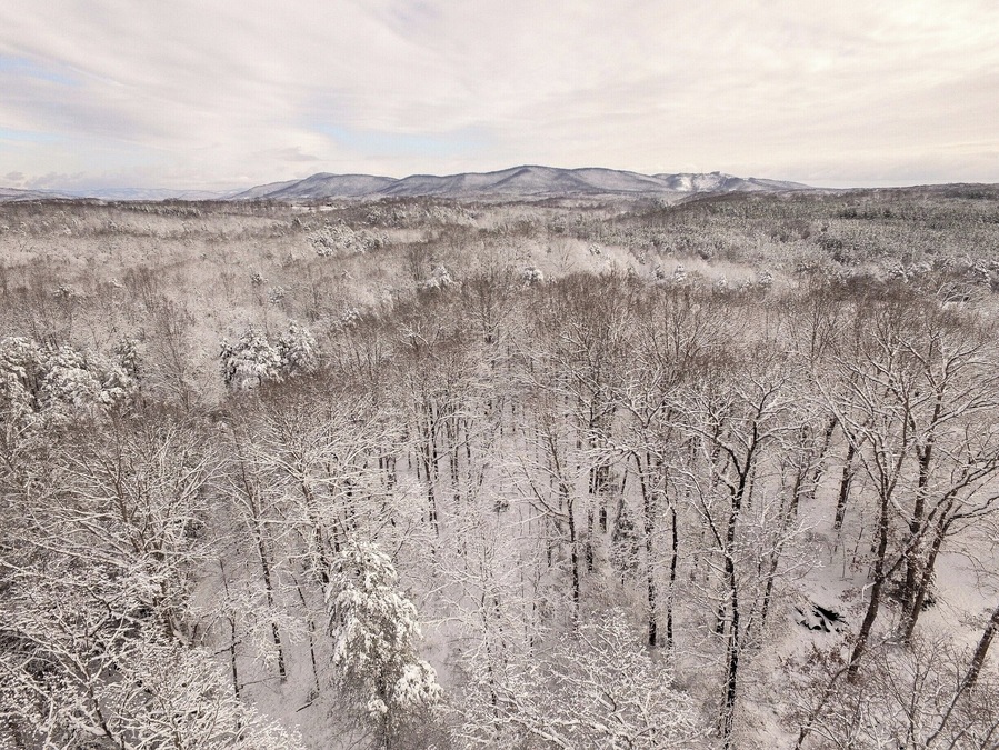 An aerial photo of a snowy Carolina morning,