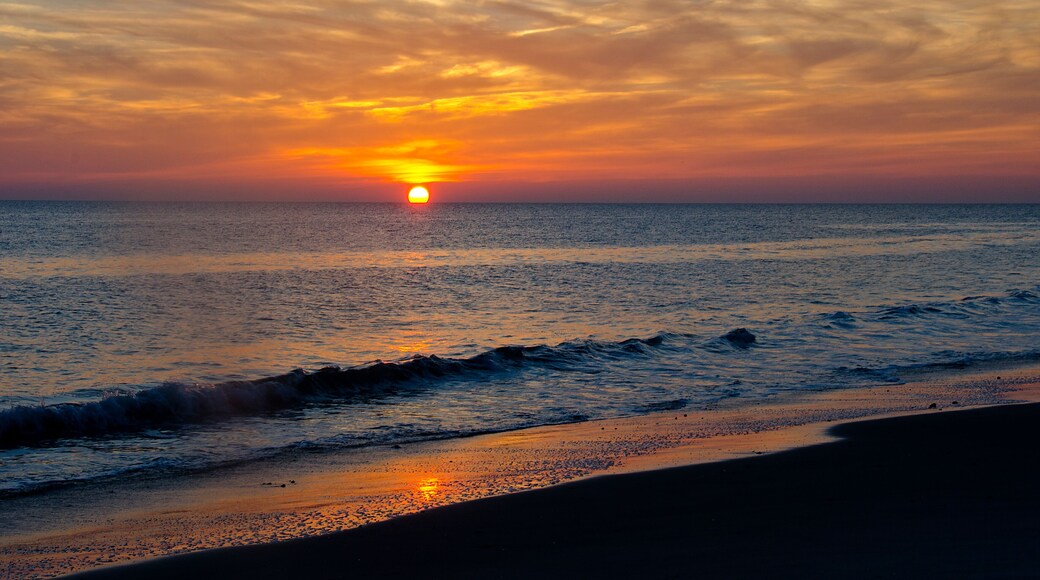Sun Dips Below Horizon on the Beach