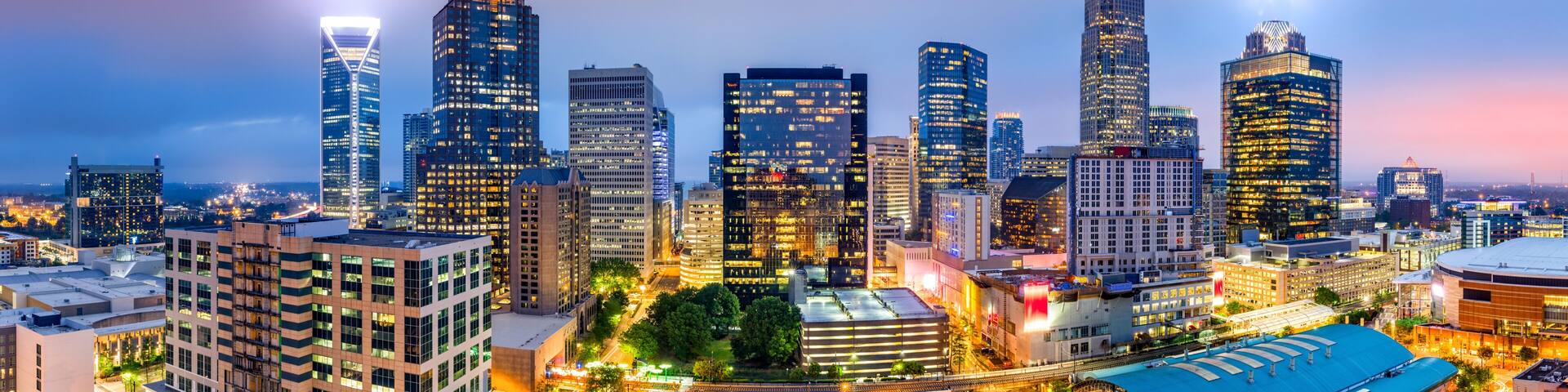 Aerial view of Charlotte, NC skyline on a foggy evening. Charlotte is the largest city in the state of North Carolina and the 17th-largest city in the United States