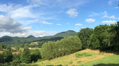 View from a friend's front porch, July 4, 2015 following a morning of rain. It turned out to be a lovely day! If you ever get a chance to visit western NC, I hope you have a day as beautiful as this.