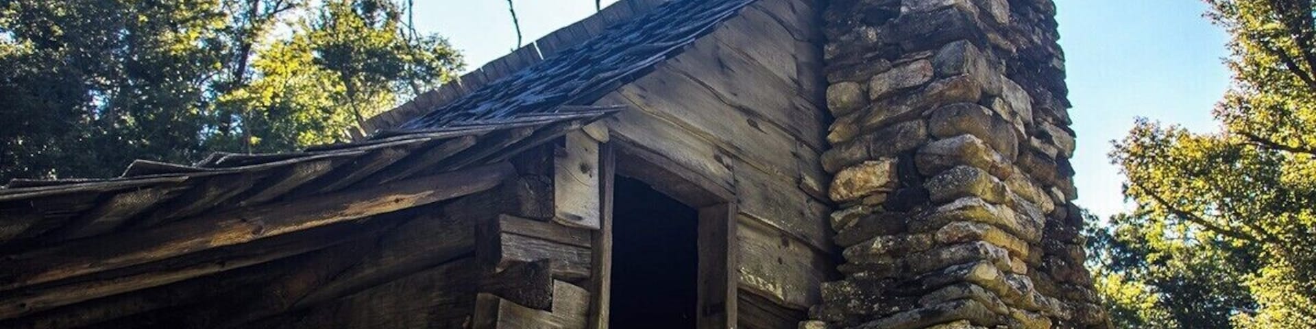 Jesse Brown's Cabin. A neat historical feature that is just about 100 yards beyond the trees at Tompkins Knob. Learn all about it here: https://www.hdcarolina.com/episode/thompkins-knob