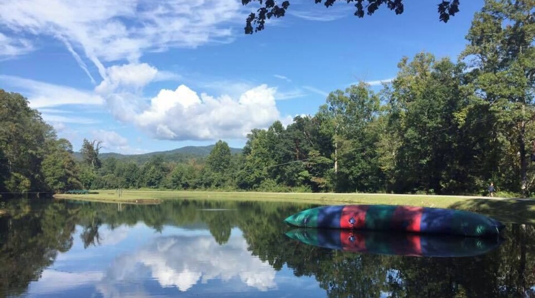 The lake is still in this picture, but soon it will be filled with kids swimming, canoeing, kayaking and BLOBBING at Camp Highlander in North Carolina. #LifeAtExpediaGroup
