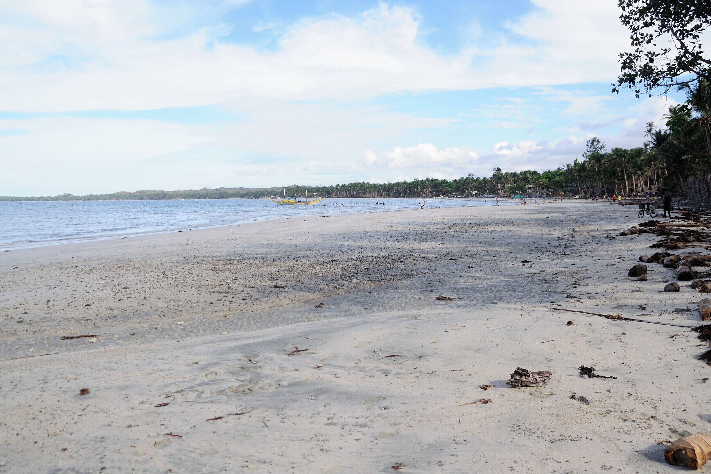A long stretch of beach is perfect for a relaxing stroll, there's a waterfall nearby too. #beach