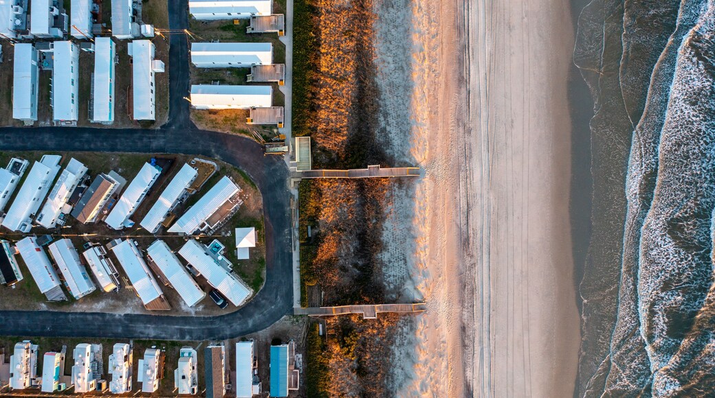 Top Down Aerial View of a Trailer Park on the Beach with Access and the Atlantic Ocean at Sunset