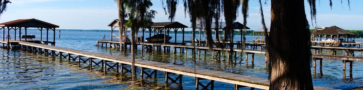Early morning sun shines across Lake Waccamaw