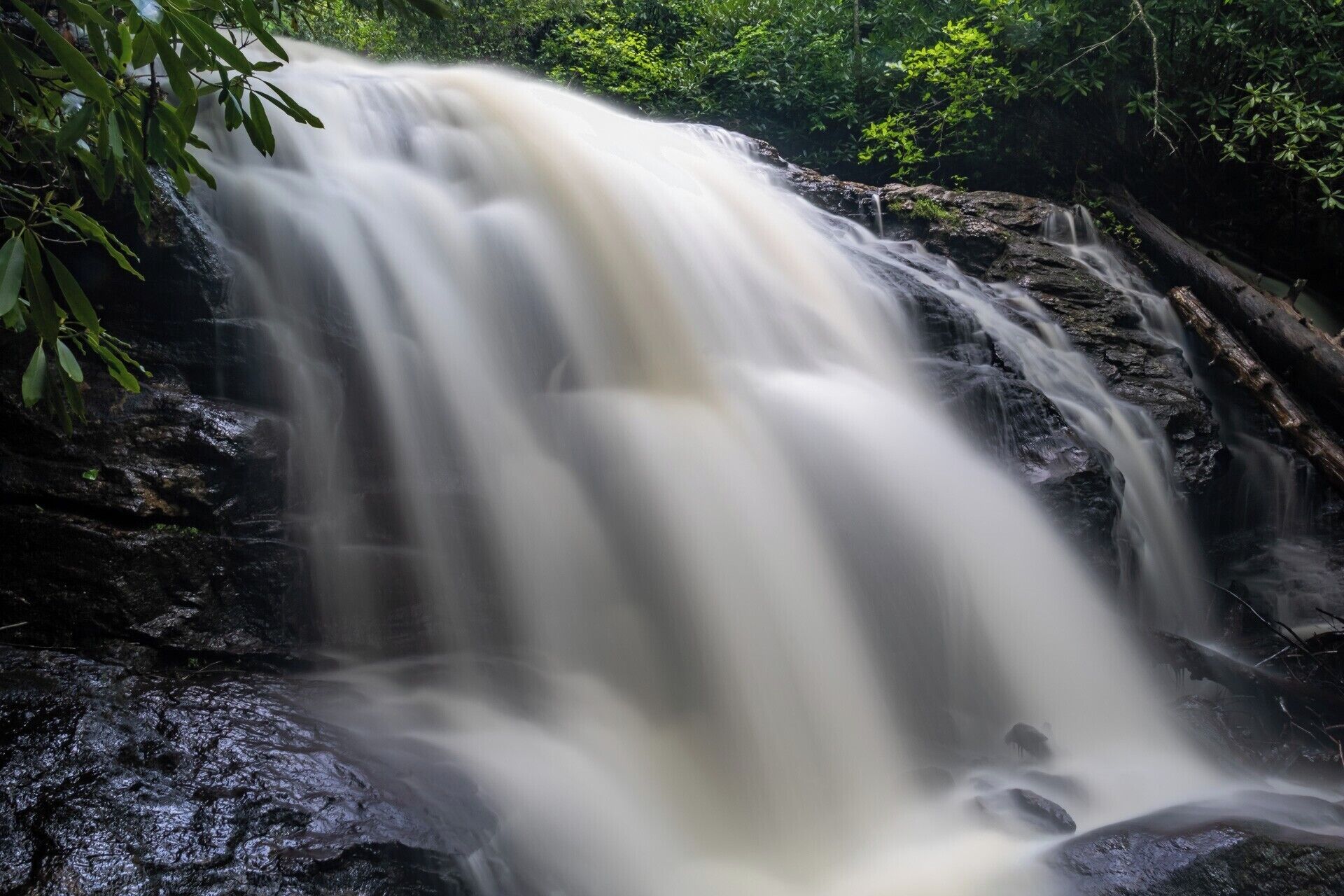 The beautiful and easy to reach Mooney Falls of the Nantahala National Forest in North Carolina.  Near Franklin, NC this long waterfall is accessed via a very short (about 1/4 mile) trail.  For a video guide of the hike to Mooney Falls, please visit:  https://www.hdcarolina.com/episode/mooney-falls